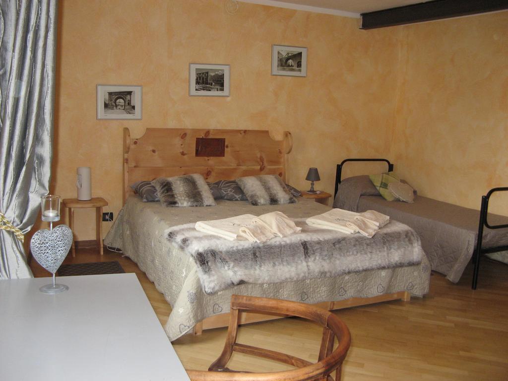 Апартаменти Maison Besenval Аоста Номер фото